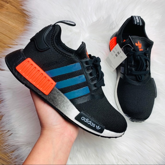 nmd core black solar orange